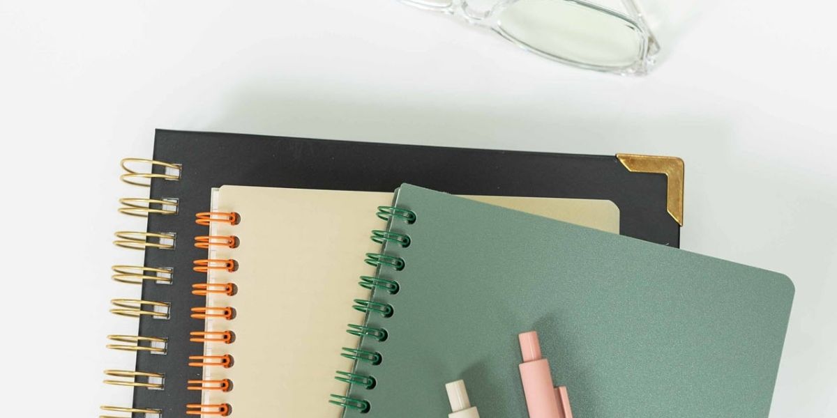 notebooks on a white table